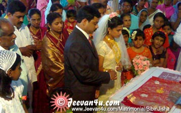 BIBIN JISHA Wedding photo at St Augustine's Forane Church Ramapuram Pala